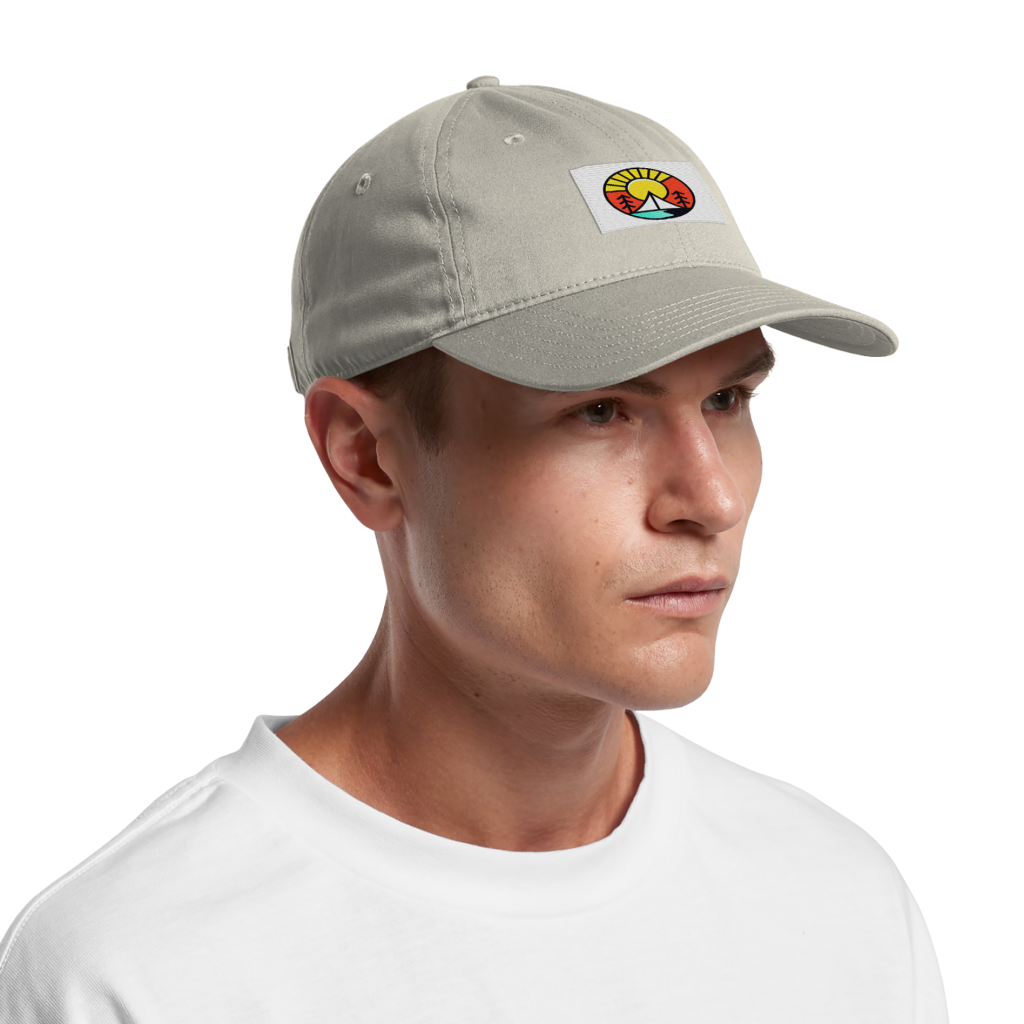 model wearing a cap with a woven label, showcasing label placement for personalized hat designs