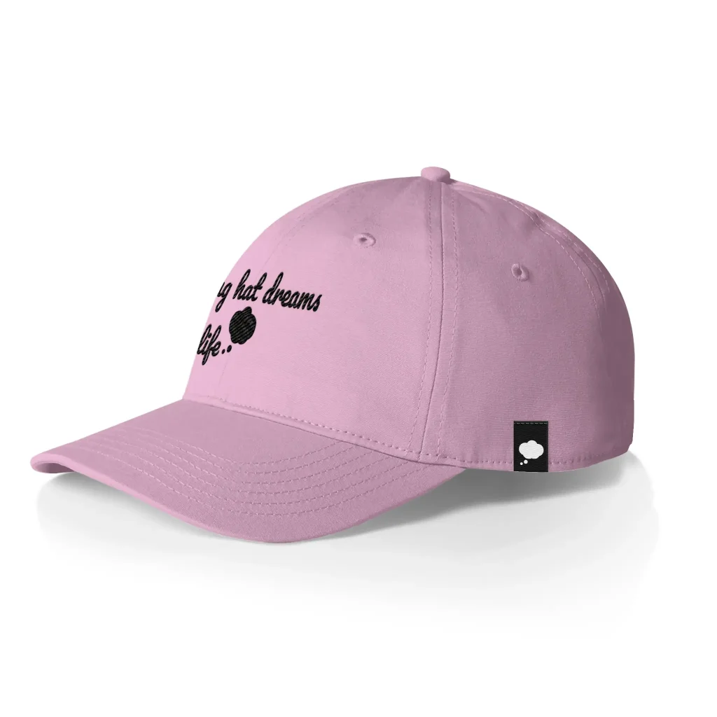 pink dad hat with woven label sewn on the side