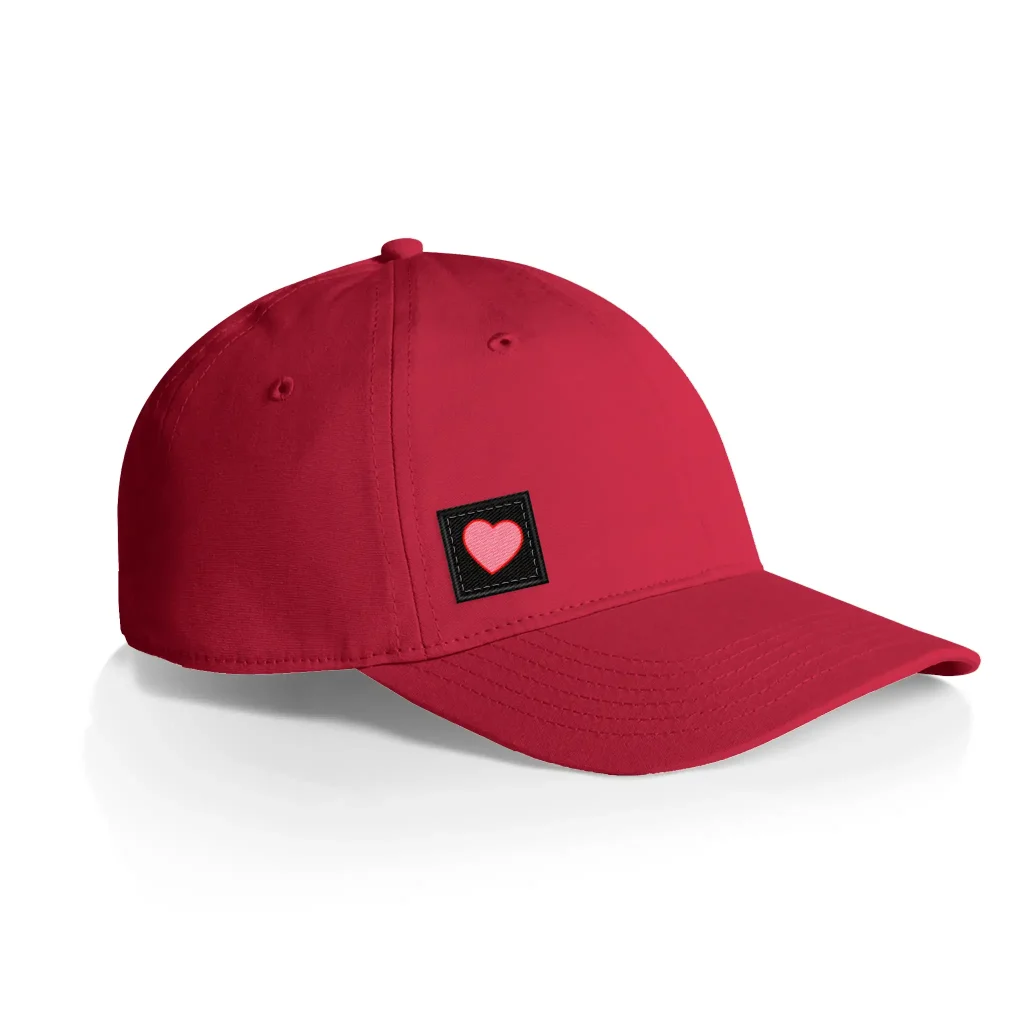 red dad hat with custom patch sewn on lower right