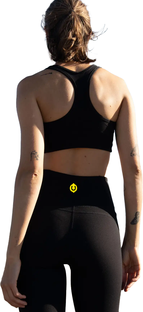 Custom yoga pant mockup with logo design on waistband for activewear branding by Apliiq