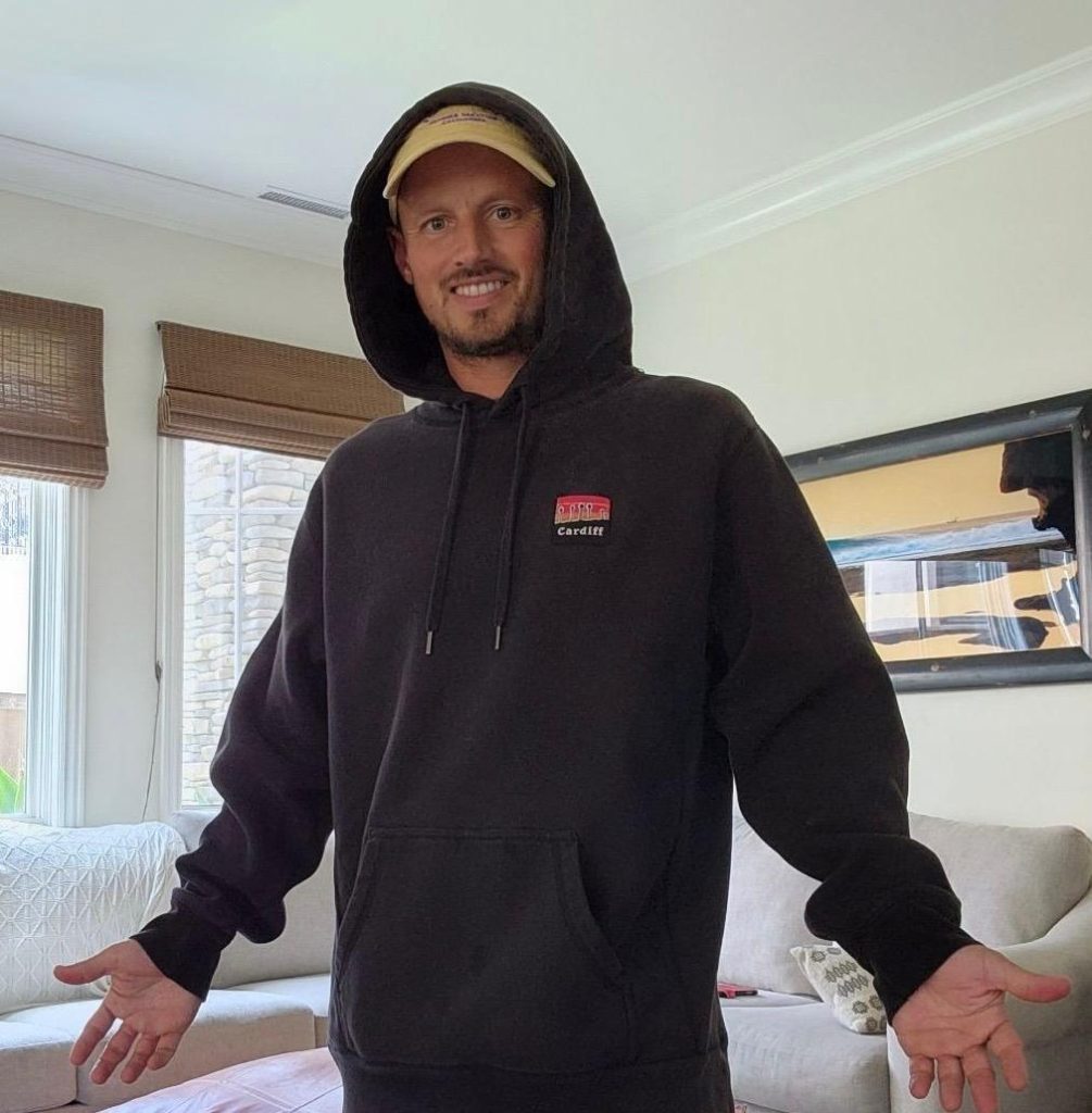 Branded hoodie featuring left chest patch detail