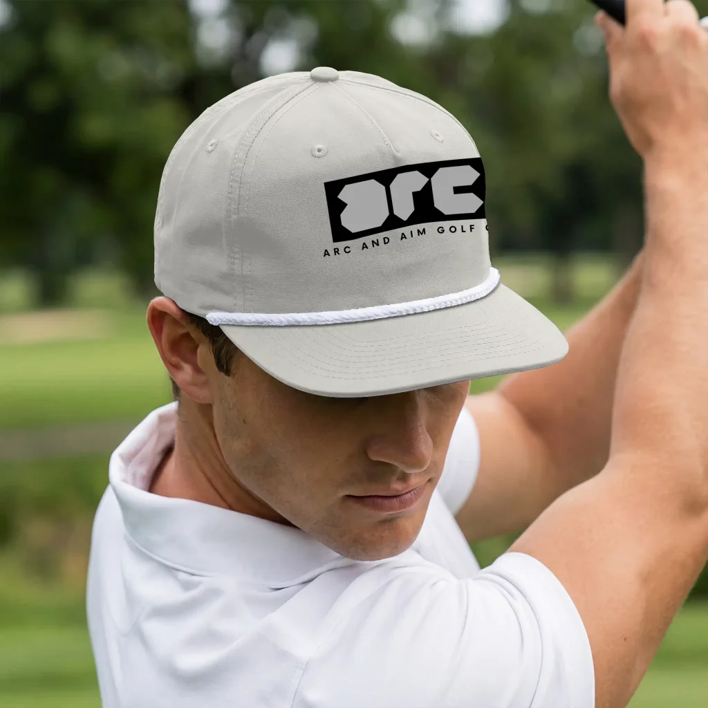 AS Colour Surf Rope Cap 1123 with front graphic design, rope detail, and structured fit, shown in Apliiq mockup for print on demand hats.