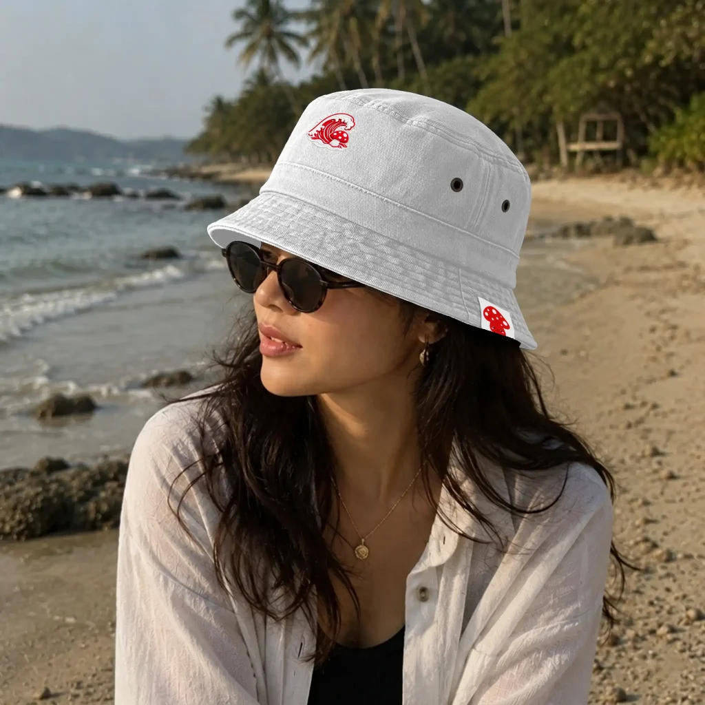 Pigment Dyed Twill Washed Bucket Hat 7801 featuring custom front embroidery and a folded woven label in an Apliiq mockup.